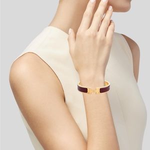 Hermes clic h bracelet in burgundy and gold